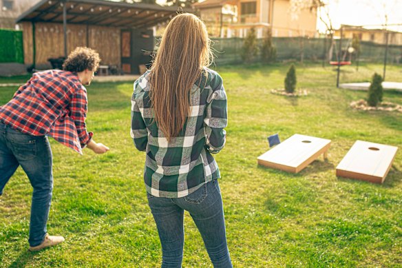 Cornhole is a matter of stoic seriousness. Things get competitive.
