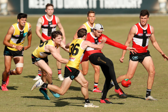 Saints players step up their training during the week as AFL nears its return.