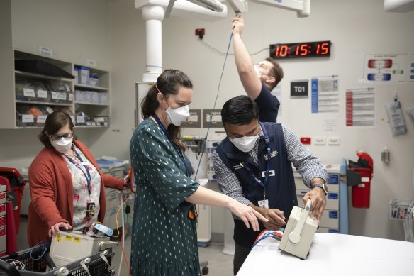 Rebecca Bailey, the manager of clinical engineering, with some of her team in the Royal Melbourne Hospital. 