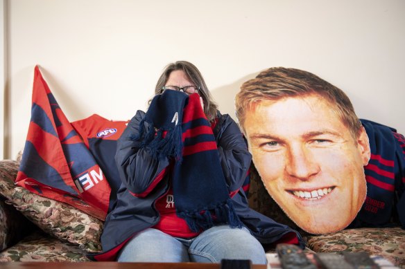 Demons cheer squad member Suzanne Considine has had ups and down in her support for the Melbourne Demons.