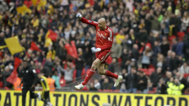 Watford goalkeeper Heurelho Gomes joins the celebrations as his side seals a 3-2 FA Cup semi-final in over Wolverhampton Wanderers.