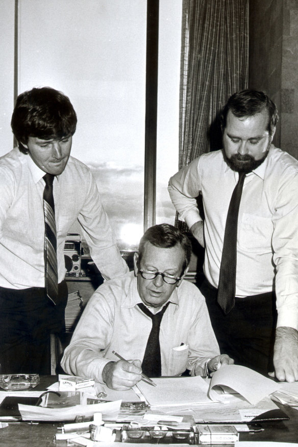 Age editor Creighton Burns flanked by  reporters David Wilson (left) and Lindsay Murdoch.