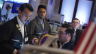 Traders work on the floor of the New York Stock Exchange. A brutal sell-off earlier in the week gave way to a relief rally on Wall Street.