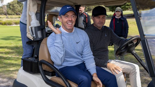 Rory McIlroy greets fans at Royal Melbourne. 