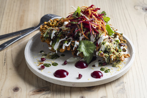 Kale chips battered in chickpea flour, with beetroot puree and drizzled with a trio of chutneys.