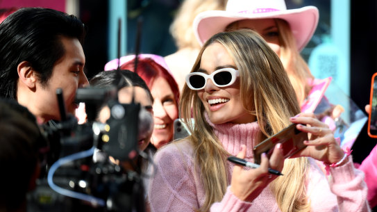 Margot Robbie poses for photos during a Barbie fan event at Westfield Sydney in June.