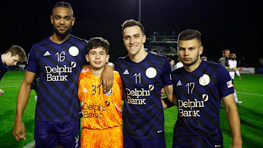 Cannons goalkeeper Ymer Abili (second from left) with teammates (from left) Nicolas Niagioran, Wade Dekker and Allen Korkaric.