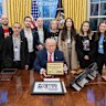 US President Donald Trump with Israeli hostages released from Gaza (from left): Iair Horn, Omer Shem Tov, Eli Sharabi, Keith Siegel, Aviva Siegel, Naama Levy, Doron Steinbrecher and Noa Argamani at the White House.