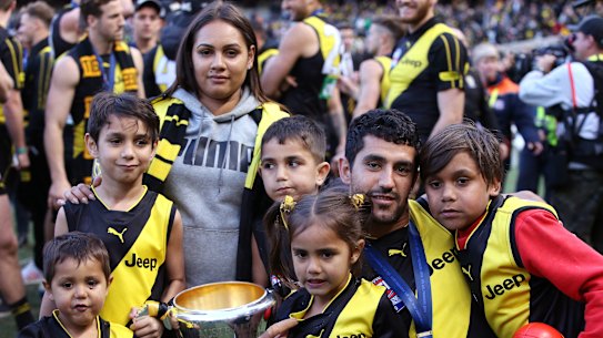 Marlion Pickett with his family after Richmond's grand final triumph in 2019.