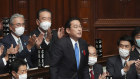 Fumio Kishida is applauded after being elected Japan’s prime minister in the parliament’s lower house on Monday. 