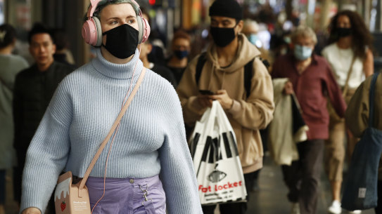 People wearing masks in the CBD.