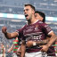 Luke Brooks and the Sea Eagles celebrate a try and victory in Las Vegas.