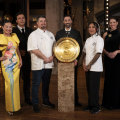 The MasterChef finalists and judge and their big shiny plate.