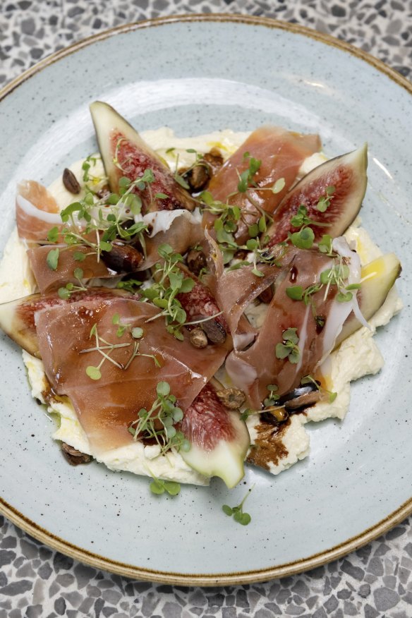 Fresh figs with sliced prosciutto and whipped ricotta.