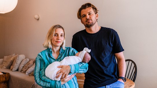 Tom Parish, his wife Kristy and their daughter Kaih. The family cut back on spending and refinanced their home loan as interest rates rise.