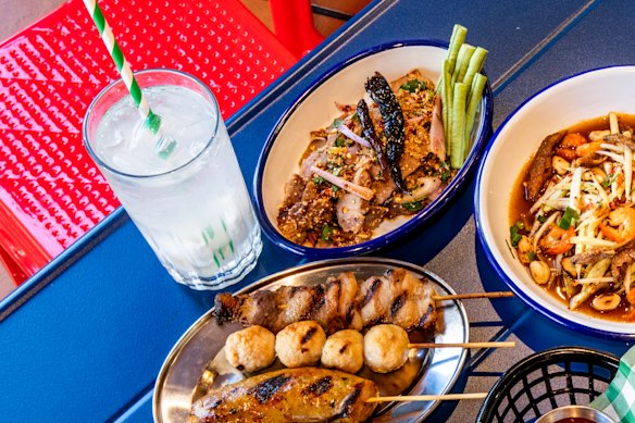 Grilled meat skewers, pork nam tok and an icy coconut vodka cocktail.