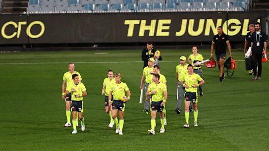 MELBOURNE, AUSTRALIA - MARCH 19: The Umpires walk out prior to  the round 1 AFL match between the Richmond Tigers and the Carlton Blues at Melbourne Cricket Ground on March 19, 2020 in Melbourne, Australia. (Photo by Robert Cianflone/Getty Images)
