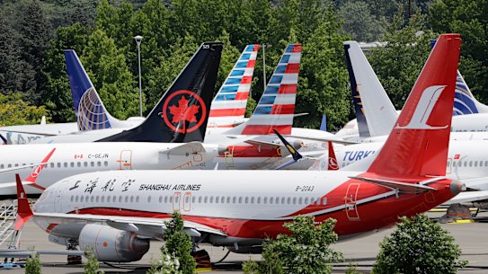 Dozens of grounded Boeing 737 MAX plans crowd a parking area in Seattle. Are there other Boeing models with software problems?