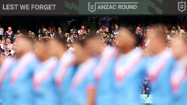 The Roosters during the pre-game ceremony.