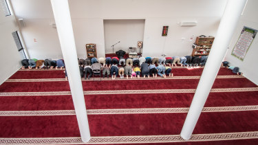 Men take part in the early afternoon prayer at Gungahlin Mosque on Saturday.