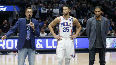 Rallying for relief: Mavericks guard Ryan Broekhoff, left, Philadelphia 76ers guard Ben Simmons (25) and former 76ers forward Jonah Bolden, right, encourage fans to donate to an Australian bushfire charity fund, prior to their NBA game in Dallas in January.