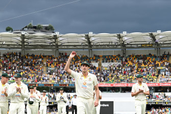 Pat Cummins celebrates his five-wicket haul.