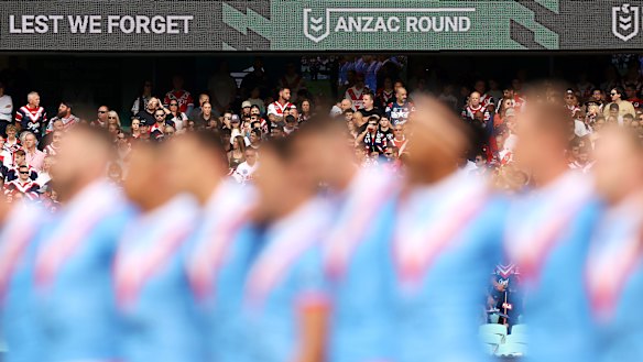 The Roosters during the pre-game ceremony.