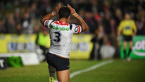 Trademark move: Latrell Mitchell breaks out his "little kangaroo" celebration in recognition of his Indigenous roots.