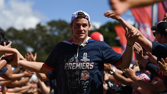 Champion: Luke Keary enjoys the Roosters' fan reception after his starring role in their grand final win.
