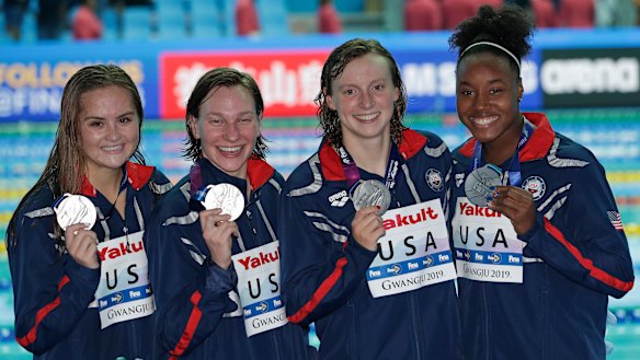 United States women's 4x200m freestyle relay team pose with their silver medals.