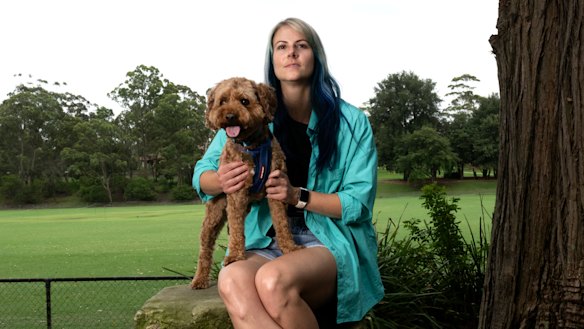 Rachael Dodd, whose FND came on suddenly in 2021, with her dog, Lenny.