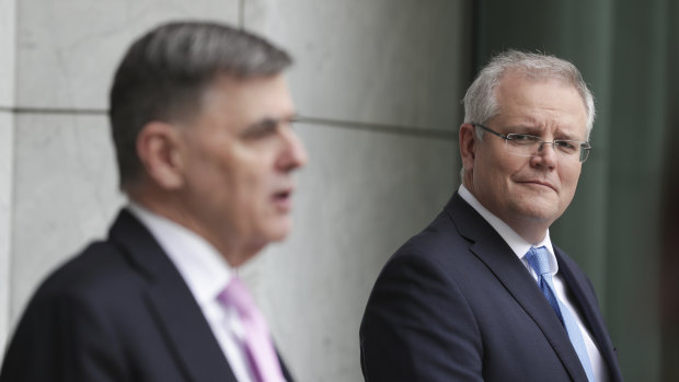 Chief Medical Officer Brendan Murphy and Prime Minister Scott Morrison are balancing protecting health and the economy.