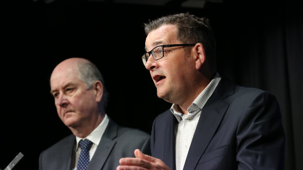 Victorian Premier Daniel Andrews, right, and Planning Minister Richard Wynne announce the $600 million cladding fund. 