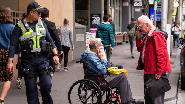 Rex Francis Elmer (centre), also known as Brother Ignatius, leaving court after a 2018 hearing.