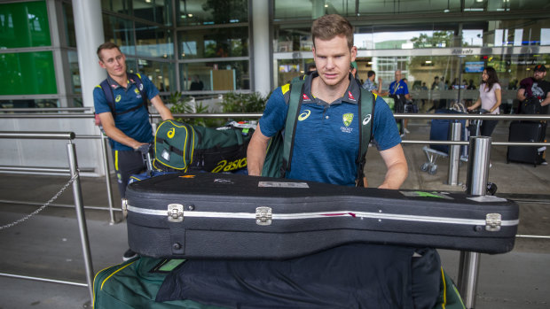 Steve Smith and Marnus Labuschagne (left) at Brisbane Airport on Friday.