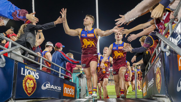 Best-afield Dayne Zorko leads his team from the field.