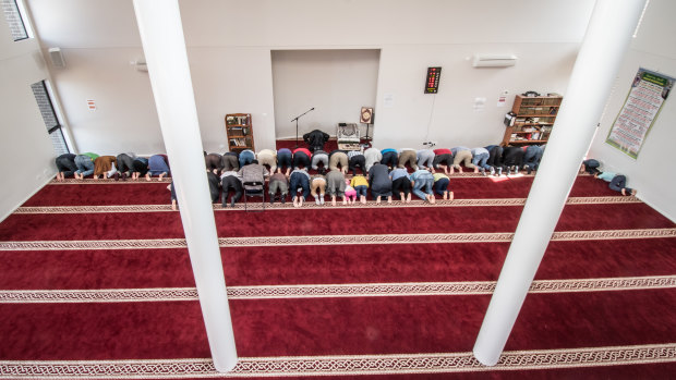 Men take part in the early afternoon prayer at Gungahlin Mosque on Saturday.