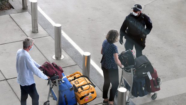 Returning passengers from a special Nepal Airlines flight repatriating Australians and New Zealanders arrive at Brisbane Airport on April 2.