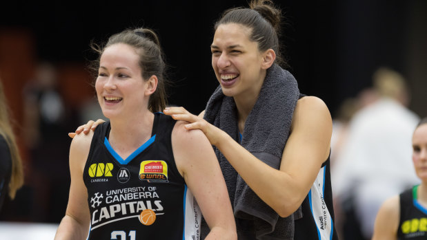 Keely Froling and Marianna Tolo are all smiles after the Capitals' win against the Fire on Friday night.