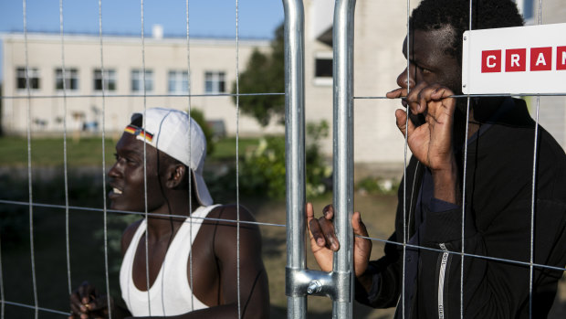 Migrants, mostly from Ivory Coast, Cameroon, Somalia, Eritrea and Senegal, held in a detention centre in an old school in Vydeniai, Lithuania.