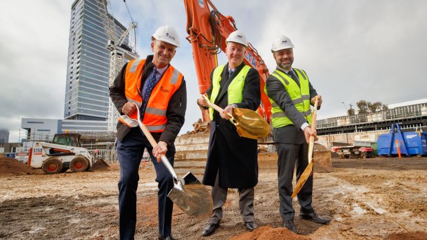 Mirvac kicks off construction of a $300 million luxury tower. From left to right: Simon Wilson from Development Victoria, Planning Minister Richard Wynne and Mirvac's Stuart Penklis.