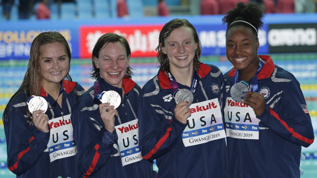 United States women's 4x200m freestyle relay team pose with their silver medals.