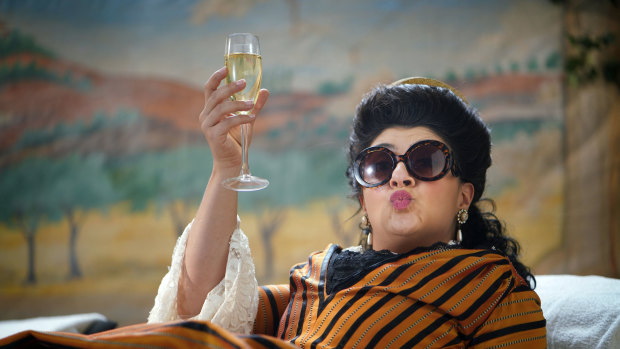 Susie Youssef as Nellie Melba in Drunk History. 