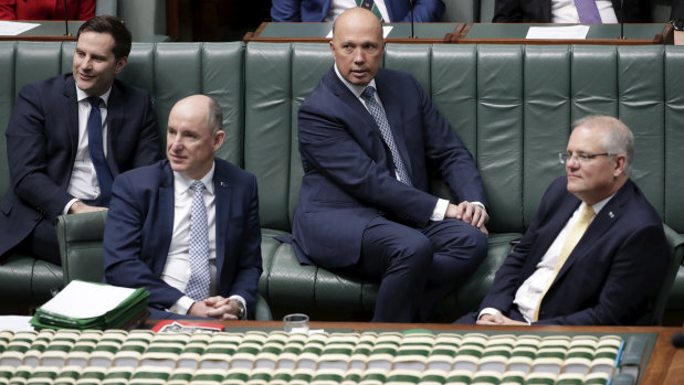 In the house: Alex Hawke, Minister for the NDIS and Government Services Stuart Robert, Minister for Home Affairs Peter Dutton and Scott Morrison.