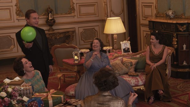 Olivia Colman, Ben Daniels, Marion Bailey and Helena Bonham-Carter in a scene from The Crown filmed in the Elizabeth Saloon at Belvoir Castle.