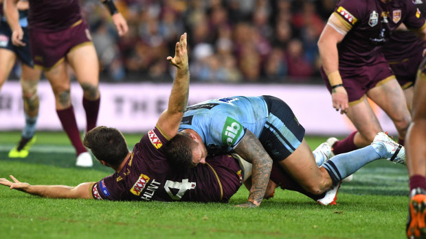 Brain snap: Tariq Sims tackles Ben Hunt without the ball.