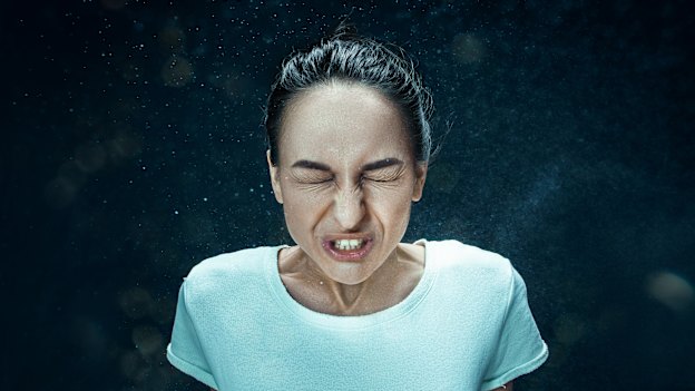 A sneeze can release thousands of droplets of virus.