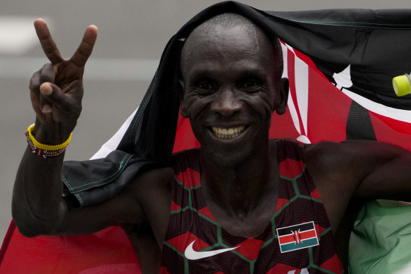 Kenyan Eliud Kipchoge celebrates winning back-to-back Olympic gold medals in the men’s marathon. 