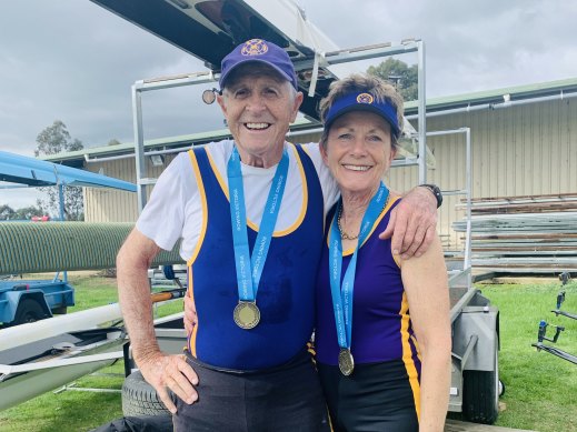 Jeff Sykes competing with his wife, Joan Sykes, in a Masters rowing competition.