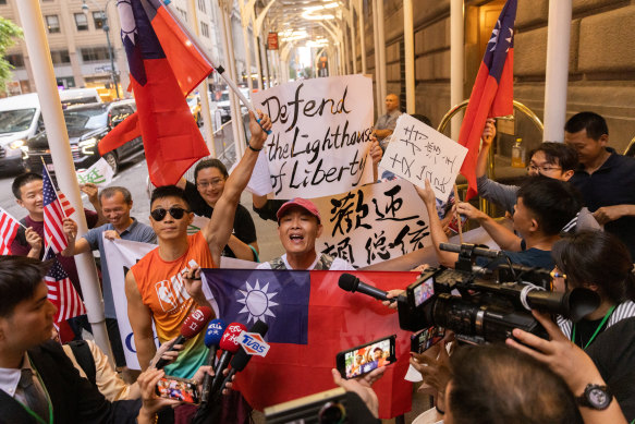 Supporters gather while Taiwan’s Vice President arrives at the Lotte Hotel in Manhattan.